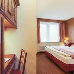 Le Petit Charme-inn Отель