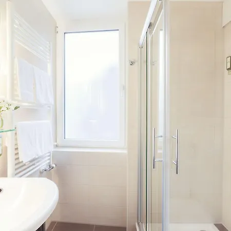 Le Petit Charme-inn Hotell